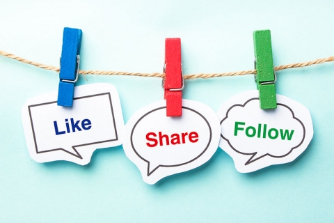 Social Media Getty Like share and follow bubbles on a clothesline