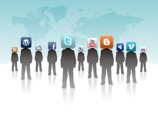 silhouettes of people with social media icons as heads