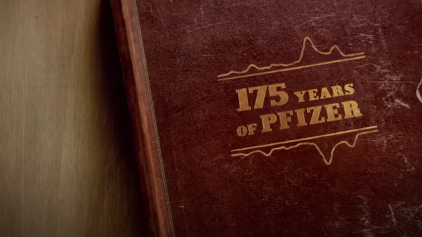 A shot from Pfizer's Super Bowl ad, showing a book titled "175 Years of Pfizer"