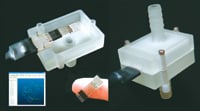 Figure 3. The design of a protective enclosure is often application specific and contributes to the performance of the device. Both plastic and glass have been used to house sensors in the laboratory and in the field. Stamped stainless steel is the likely final commercial material. 