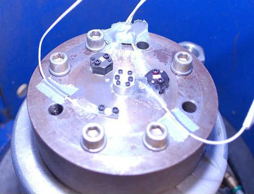 Figure 16. Suite of Endevco accelerometers mounted to the top of the VHG shock machine