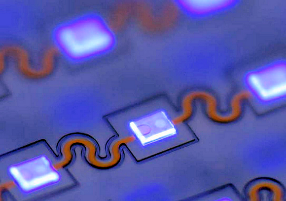 Fig. 2: Heterogeneous integration of LEDs into foil.