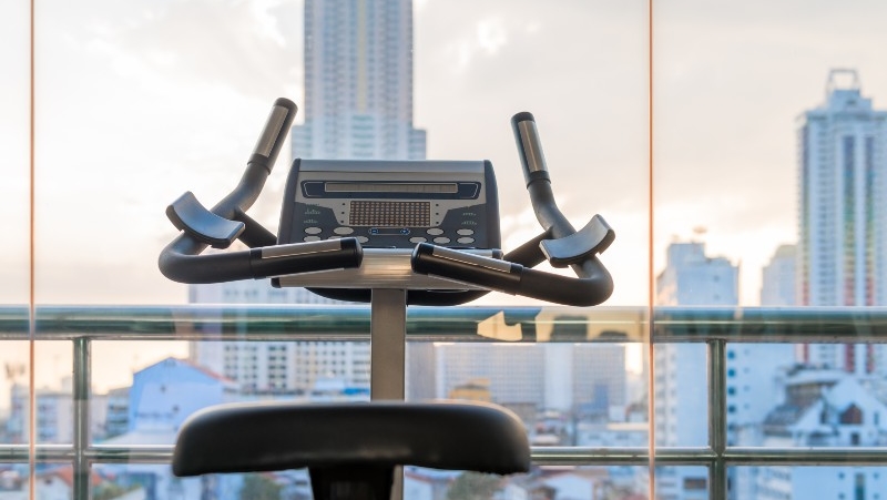 exercise bike with city view in the window