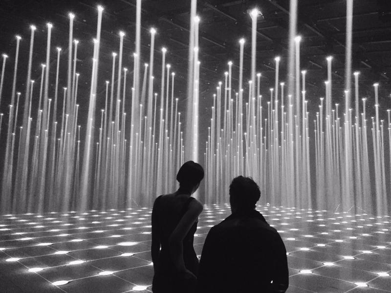 A room with hundreds of light beams