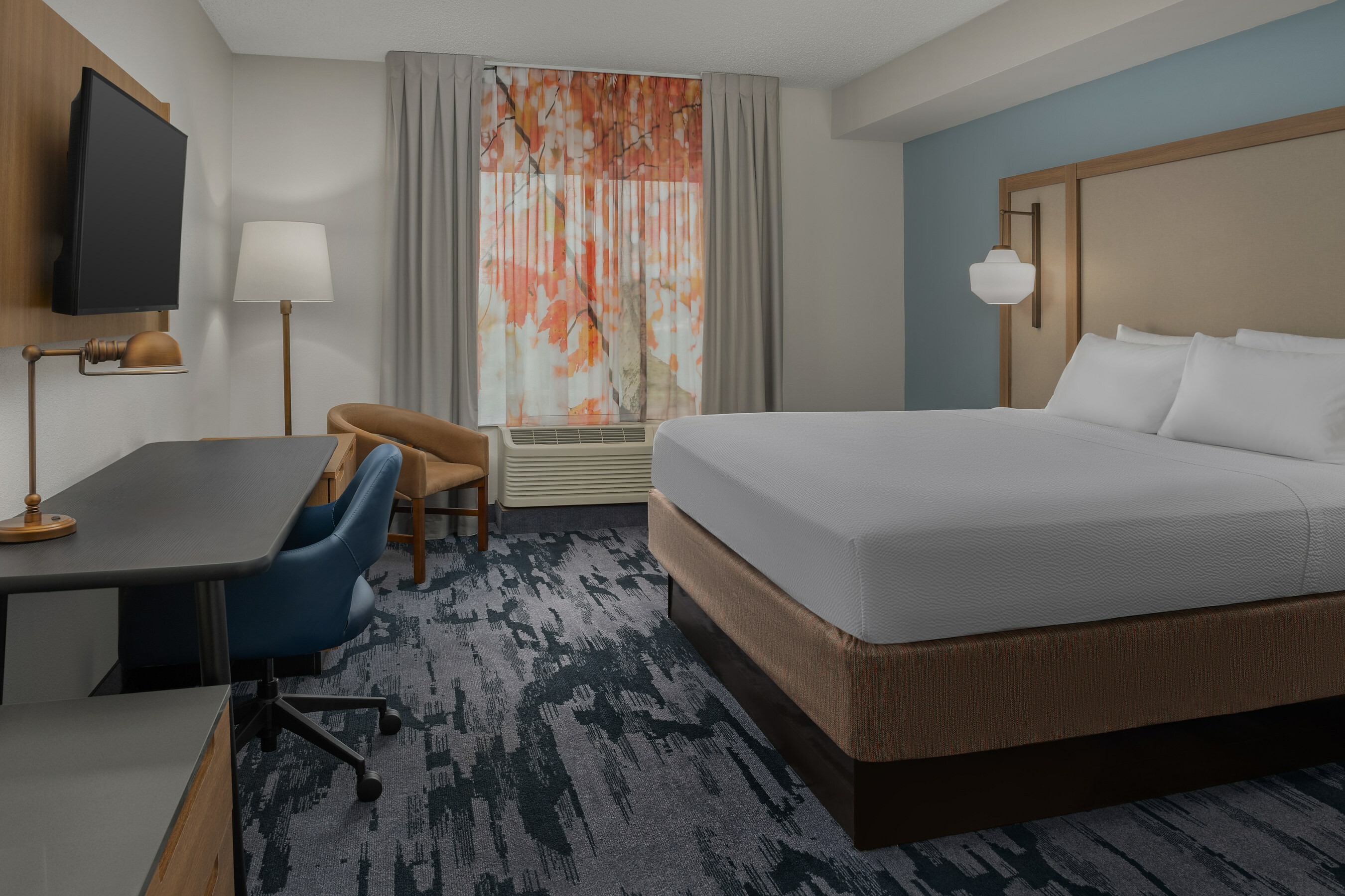 Rooms at the Fairfield Inn  Suites by Marriott Roanoke HollinsI-81 hotel offer guests modern style and ample amenities