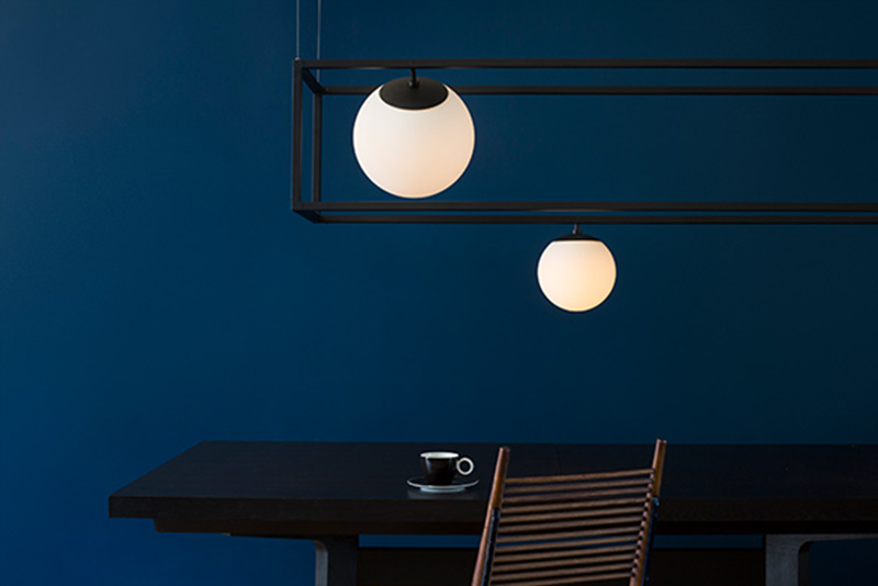 Developed with architect David Rockwell Wit is a collection of suspension luminaires with accompanying metal cubes