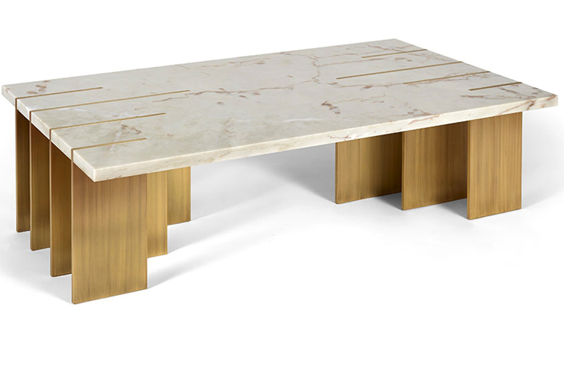 The table references Paul Klees drawing in the eight inlaid brass fingers projecting forth within the alabaster marb