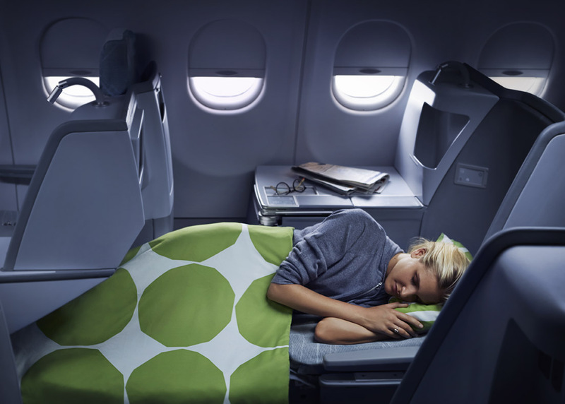 Finnair business woman sleeping