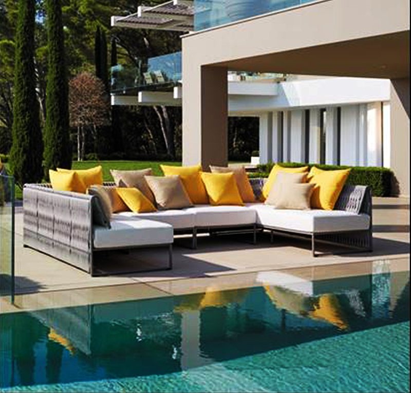 The Kalife collection uses woven polyester lacquered aluminum structure durable cushions and colorful Sunbrella fabrics  