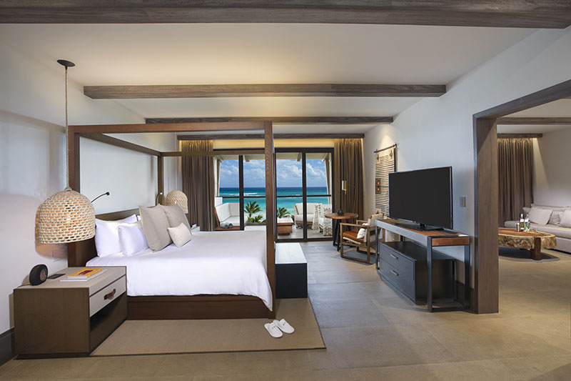 A guestroom with an ocean view at Unico Hotel Riviera Maya