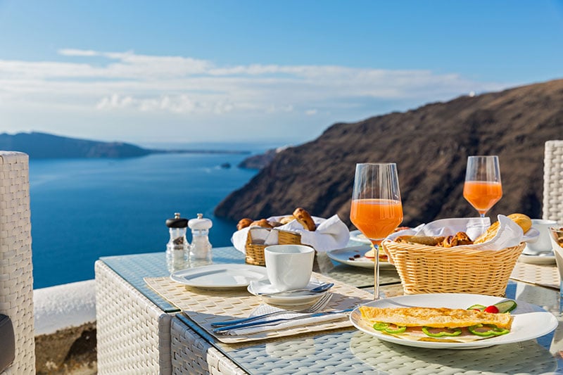 Breakfast on a balcony overlooking the ocean