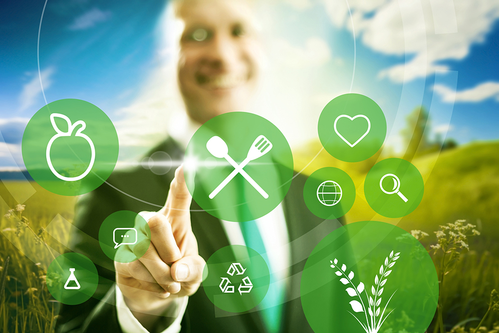 Picture of a man moving icons around on a screen