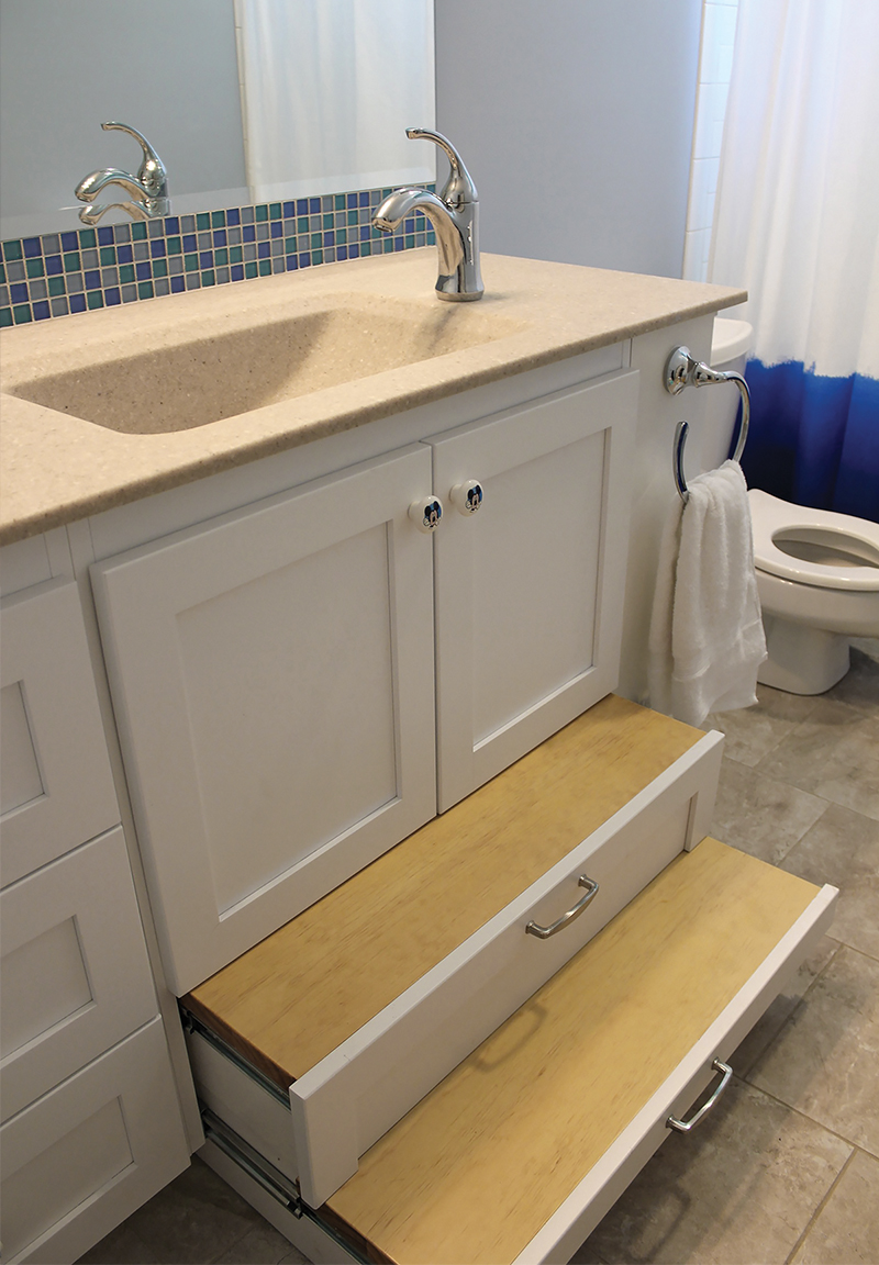 Strasser Woodenworks partnered with Schloegal Design  Remodeling to develop a brand new bathroom for a child with dwarfism 