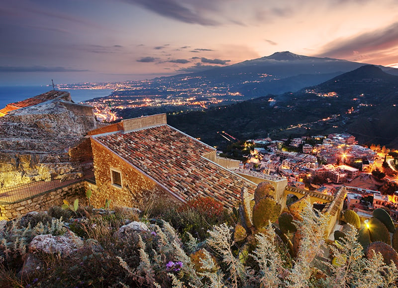 Taormina Sicily with a view of Mount Etna and the Ionian Sea
