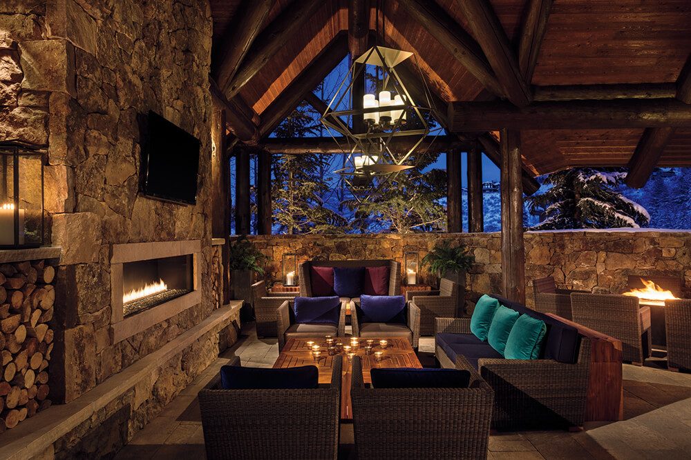 outdoor fireplace surrounded by seats