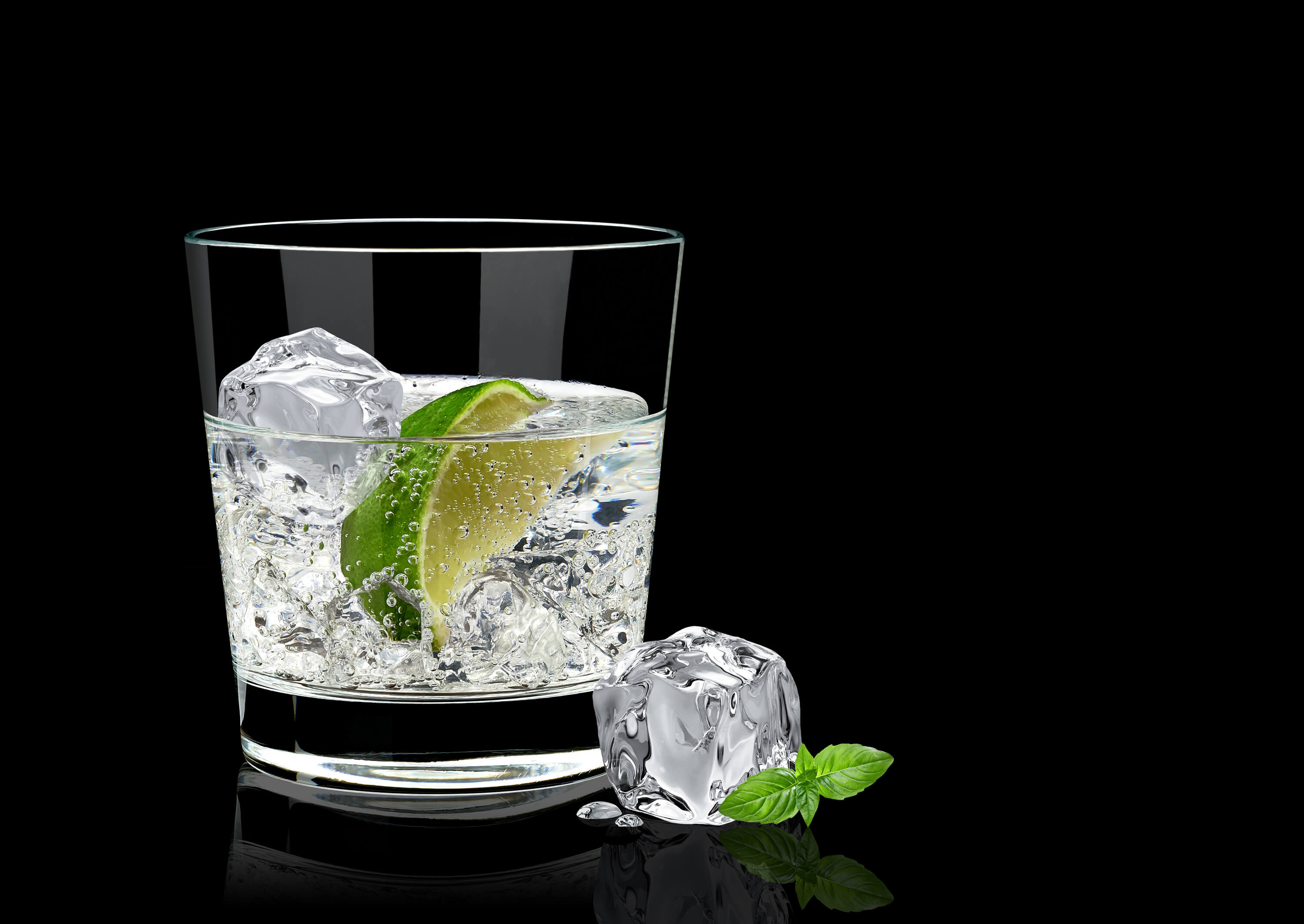 Gin and Tonic on black background