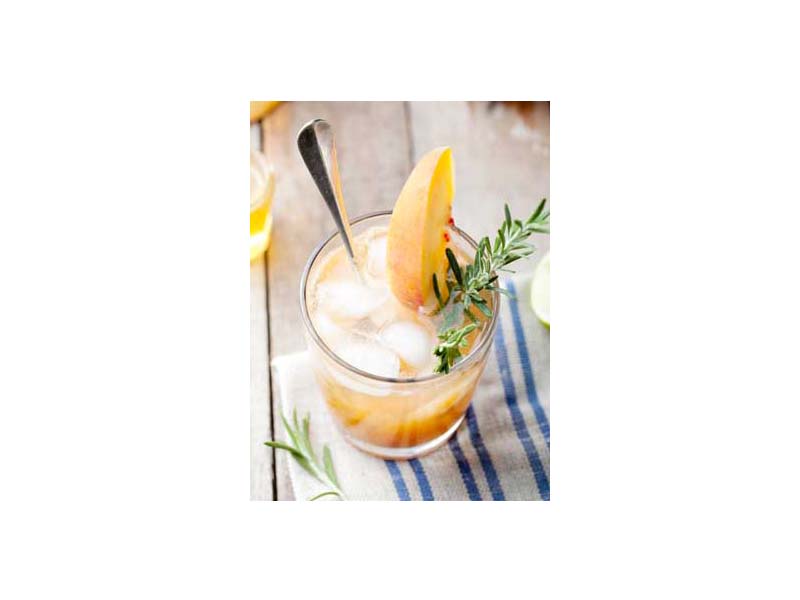 Rum and vodka peach flavored cocktail 