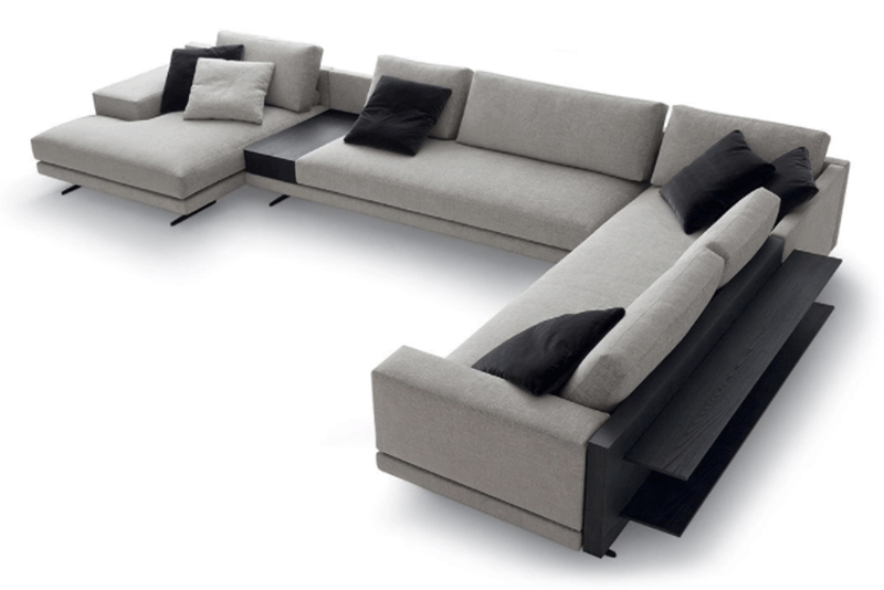 The Mondrian sofa is elevated off of the floor with its signature pronounced feet creating a play on positive and negative s