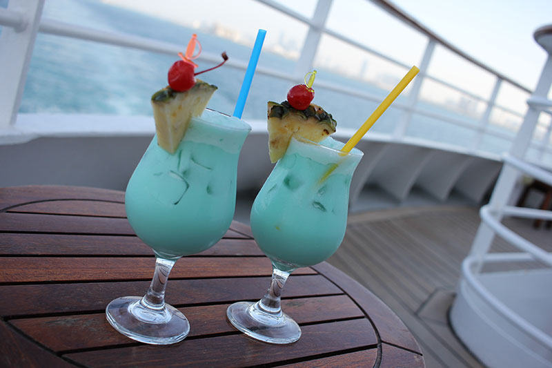 Two cocktails on the deck of a cruise ship