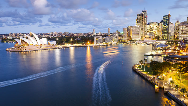 Circular Quay Sydney taken from the Sydney Harbour Bridge just after sunset showing the Sydney Opera House on the left