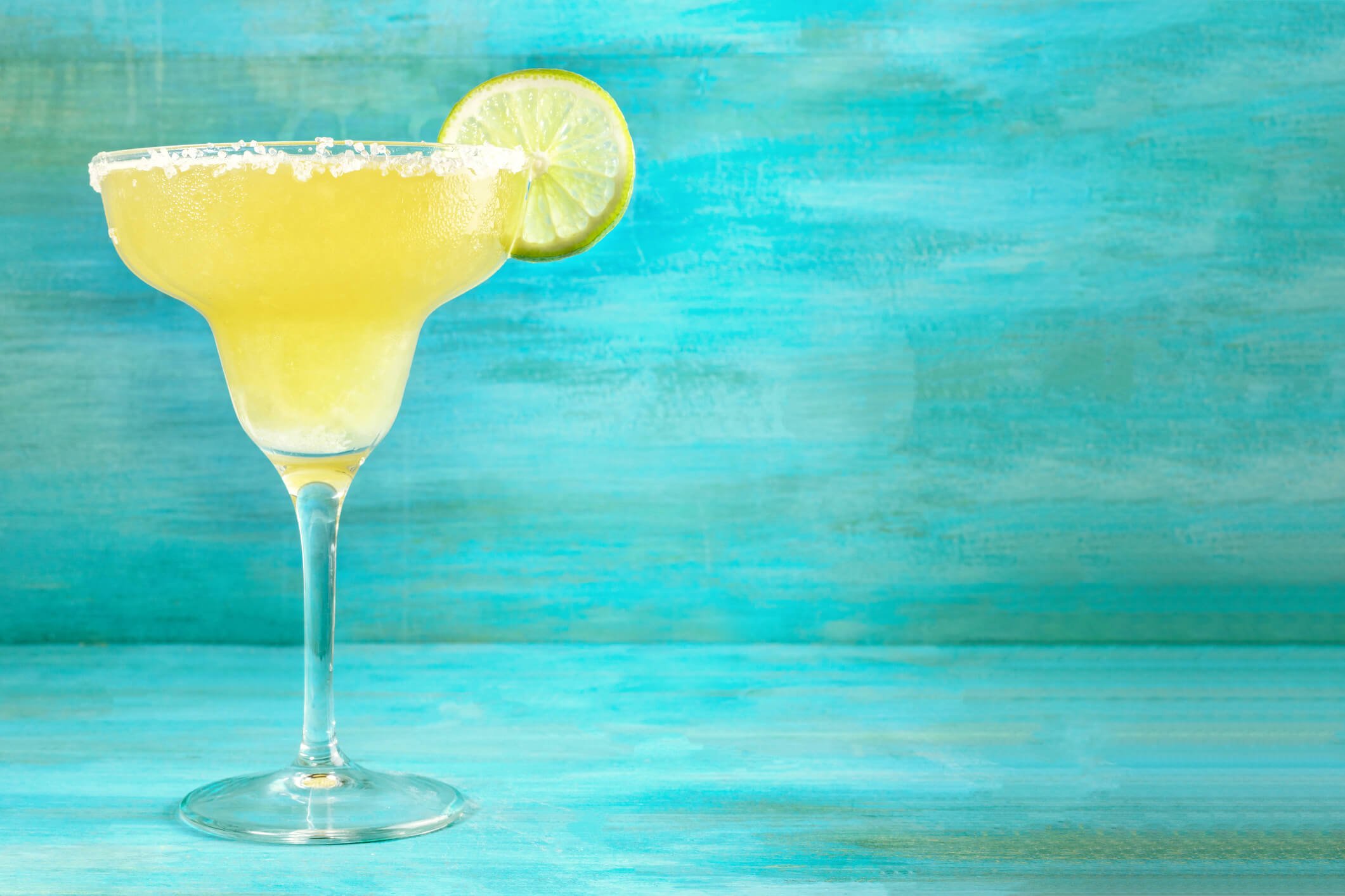Yellow Margarita on a turquoise background