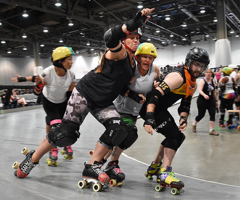women competing in roller derby