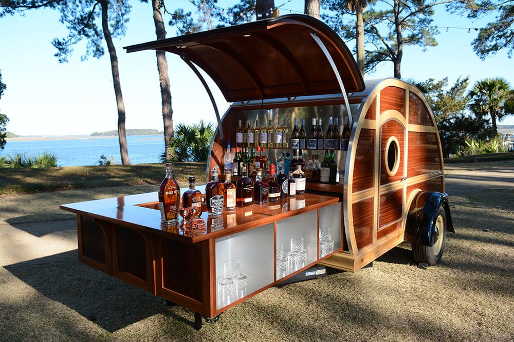 a camper that opens up to a bar