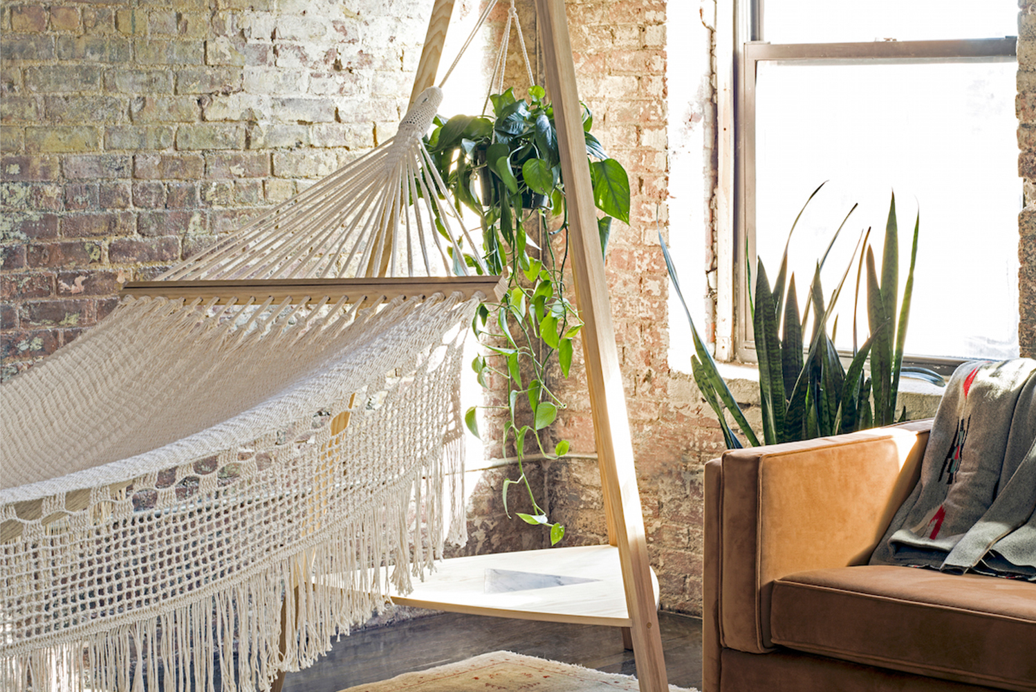 Brooklyn-based furniture design collective Pouch launched a collection of indoor hammocks and hanging chairs 