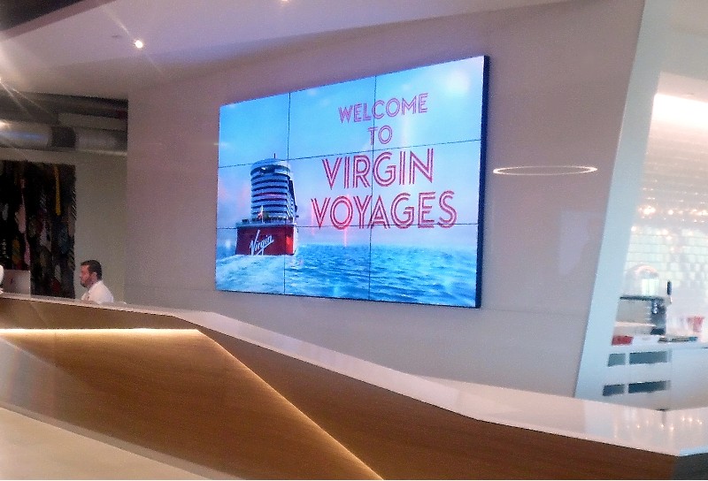 Reception desk of the new Virgin Voyages headquarters offices in Plantation FL 