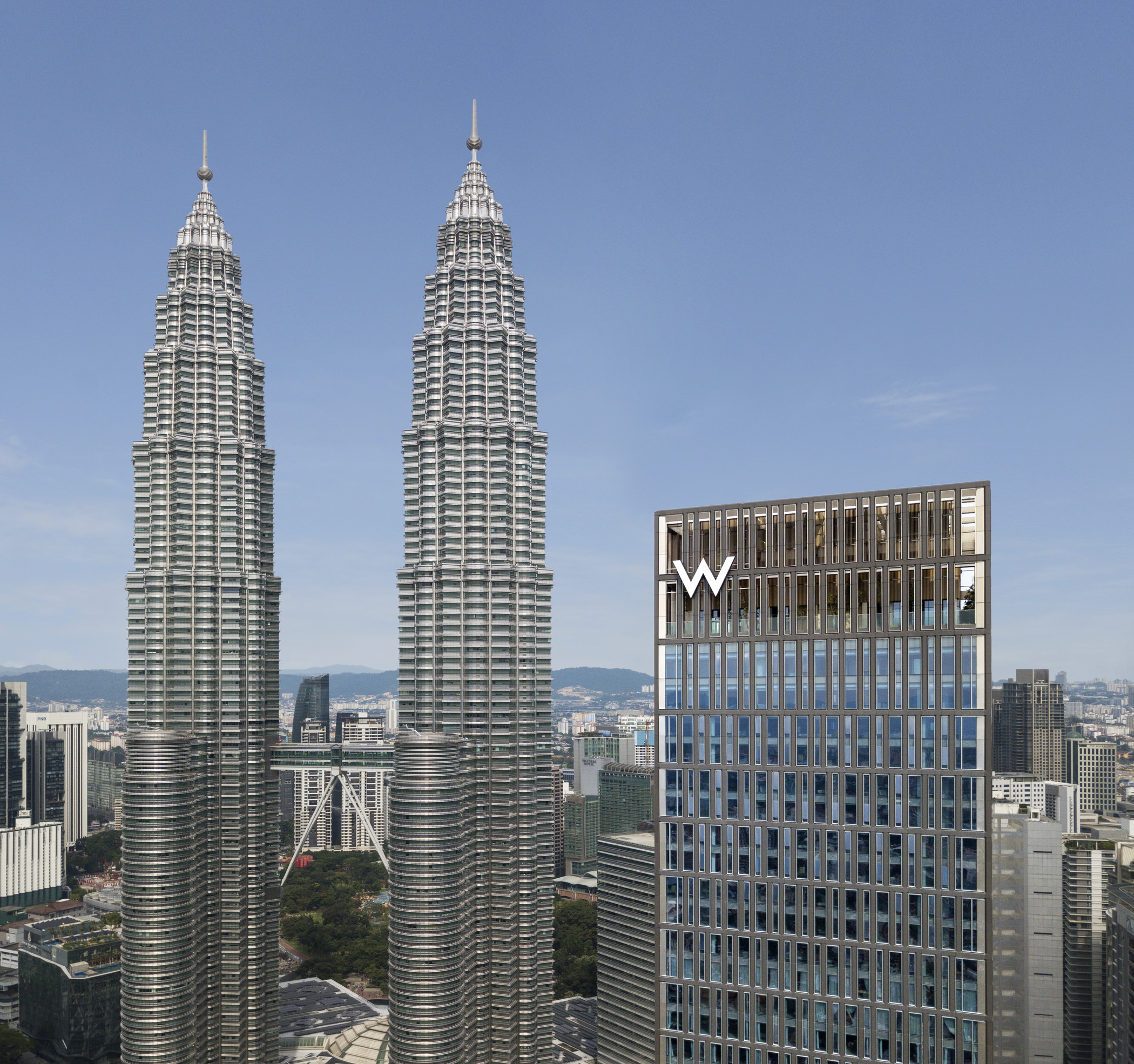 The new hotel is next to the citys iconic Petronas Towers