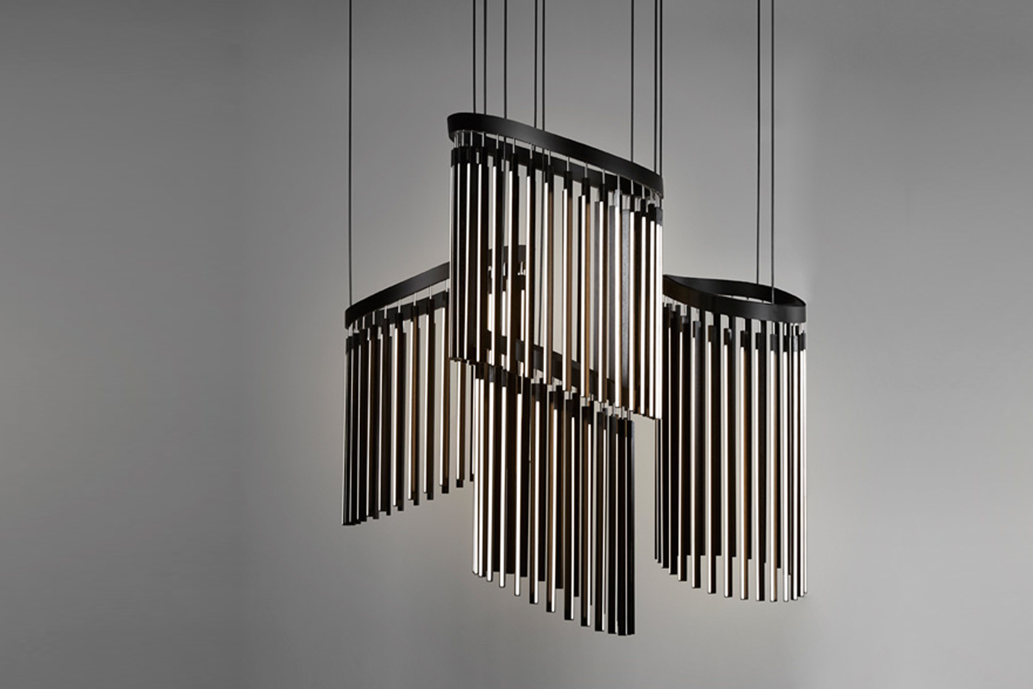 Chime a playful reinterpretation of a classic chandelier is a 10-foot-tall cascading arrangement made out of reclaimed redw
