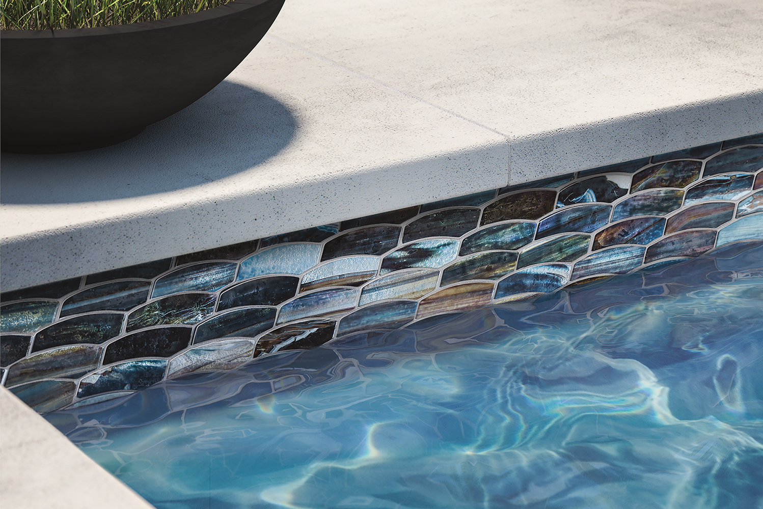 Lunada Bay Tile launched the new JAW Just Add Water collection of glass tile borders ideal for pools showers spas water