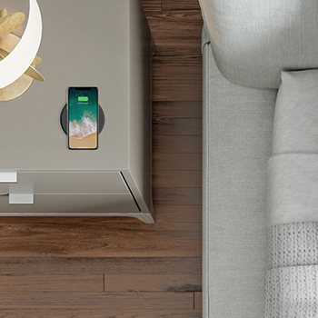 The Wiremold Wireless Charging Puck turns any table nightstand or desk into a smart wireless charger