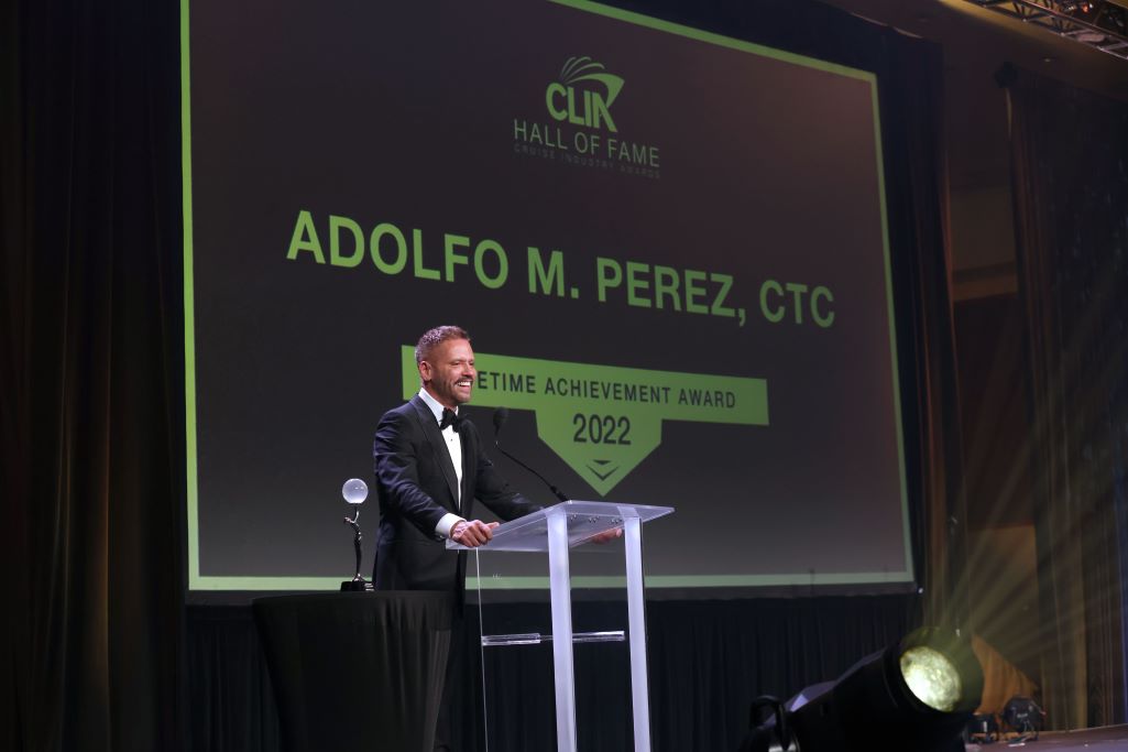 Adolfo Perez accepts CLIAs Lifetime Achievement Award at annual Hall of Fame dinner during Cruise360 in Fort Lauderdale FL