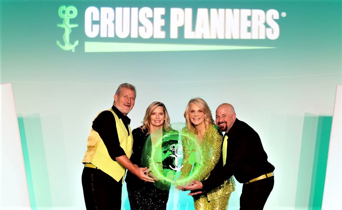 L to R Cruise Planners executives Scott Koepf Theresa Scalzitti Michelle Fee and Brian Shultz showcase new techno-tools at