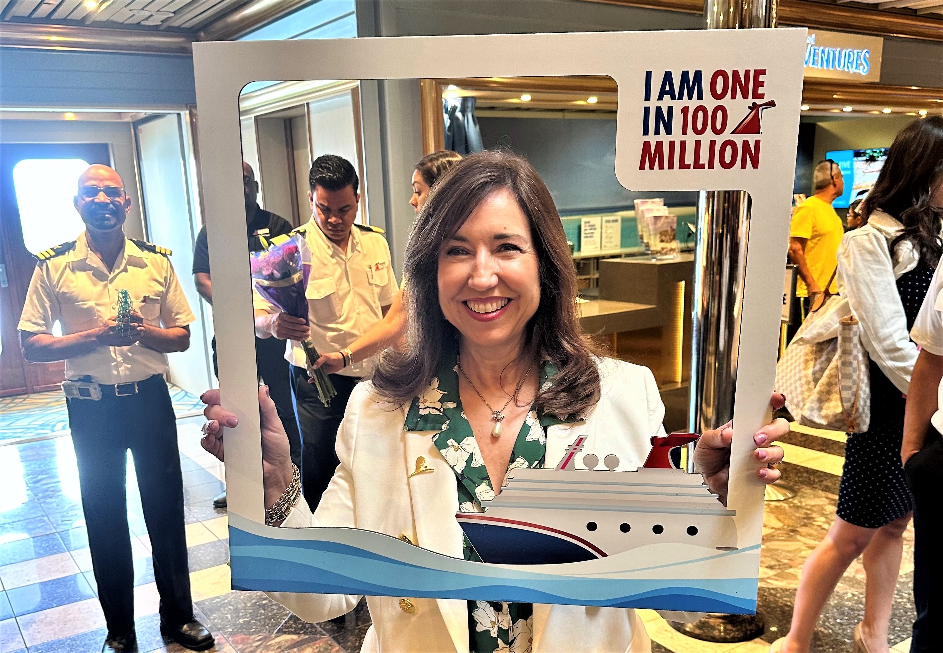 Christine Duffy of Carnival Cruise Line celebrates the lines milestone of sailing with 100 million guests She is shown aboa