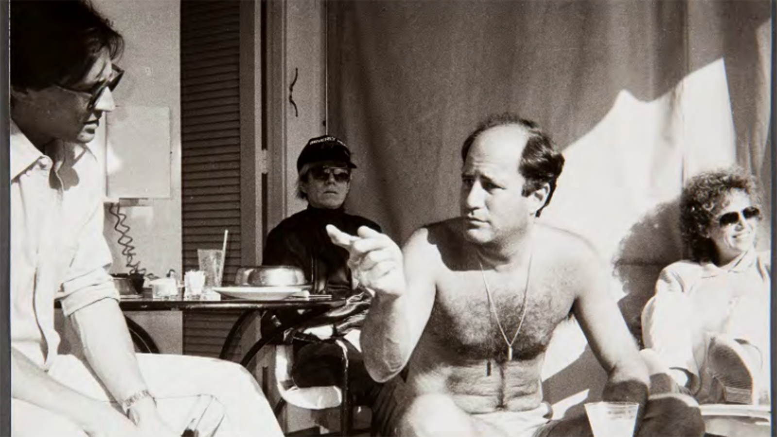 Andy Warhol with Ronald Perelman at the Beverly Hills Hotel circa 1985