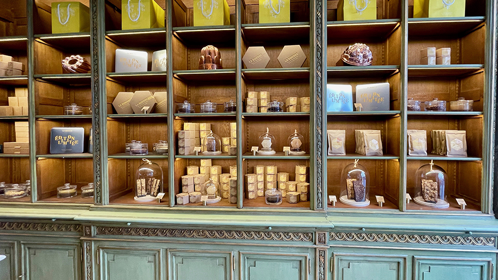 A shelf of pastries at Le Biscuit Alain Ducasse