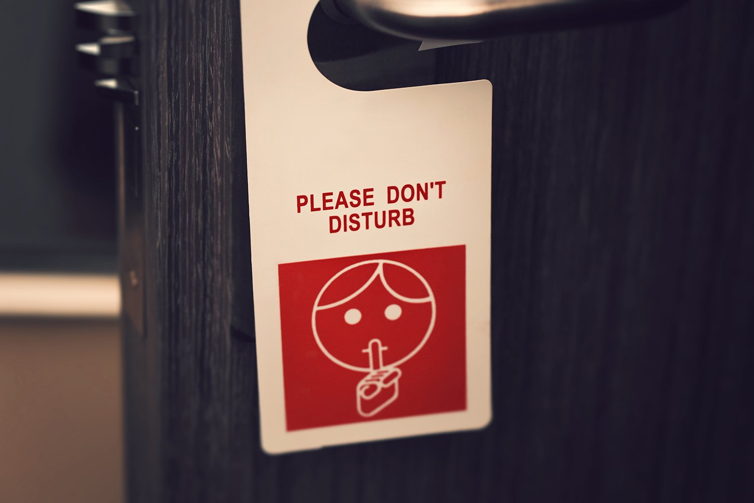Do Not Disturb sign on hotel room door