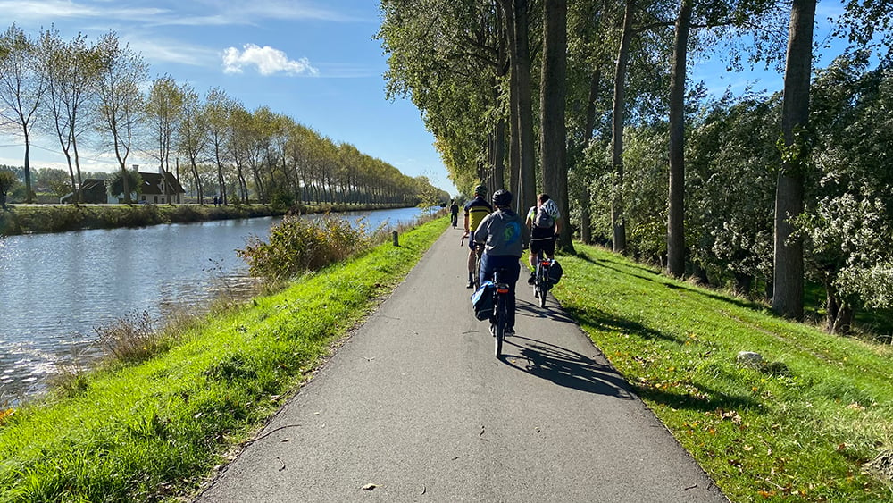 Biking in Flanders along a canal
