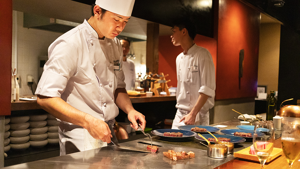 Intrepid Travel Japanese chef cooking Kobe beef