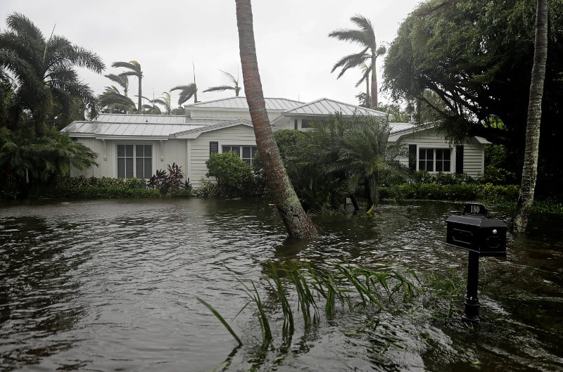 A house is surrounded by water as Hurricane Irma passes through Naples FL