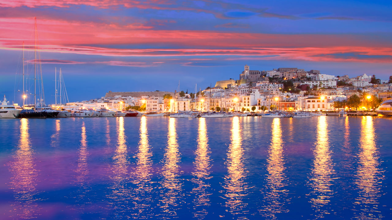 Mediterranean night view of Ibiza Island with water