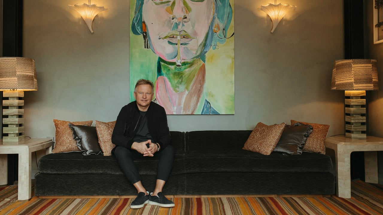 Soho House Founder and CEO Nick Jones sits in the entrance of the newly-opened Soho House Nashville