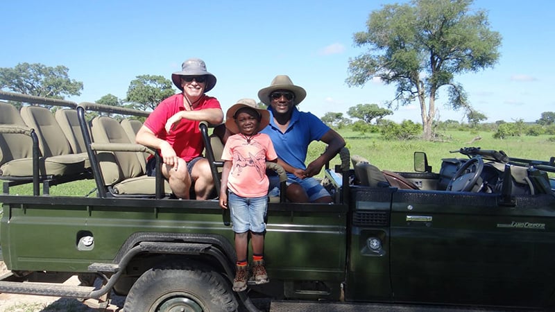 Sherwin Banda with his husband and son at Sabi Sabi Private Game Reserve