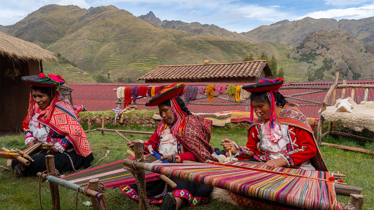 Three local female weavers in Chumbe Community Sacred Valley Peru