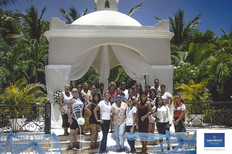 Ensembles DestinationVows specialists gather for a group photo at the Bahia Principe Punta Cana 