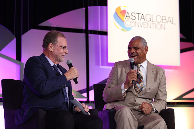 Peter Greenberg travel reporter for CBS and Arnold Donald CEO of Carnival Corporation onstage at the ASTA Global Conventi