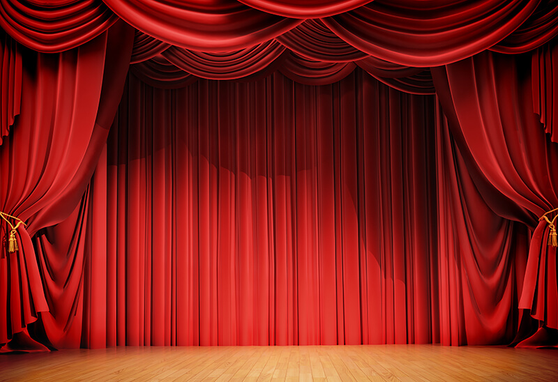 theatre stage with red curtains 