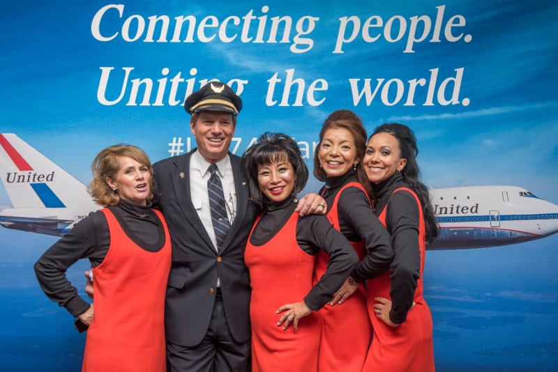 United Airlines crew celebrating the final Boeing 747 flight